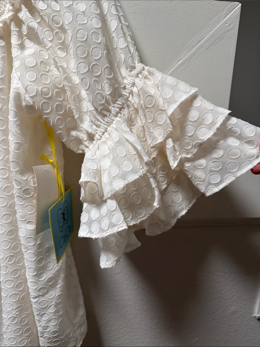 CeCe Ivory Smocked Ruffle Neck Blouse with Tiered Sleeve Ruffles - Picture 6 of 7